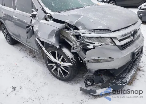 2019 Honda Pilot Touring z USA, uszkodzony, nr VIN 5FNYF6H62KB090155